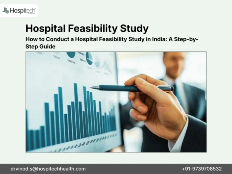 A business professional pointing at a financial bar graph during a hospital feasibility study analysis.